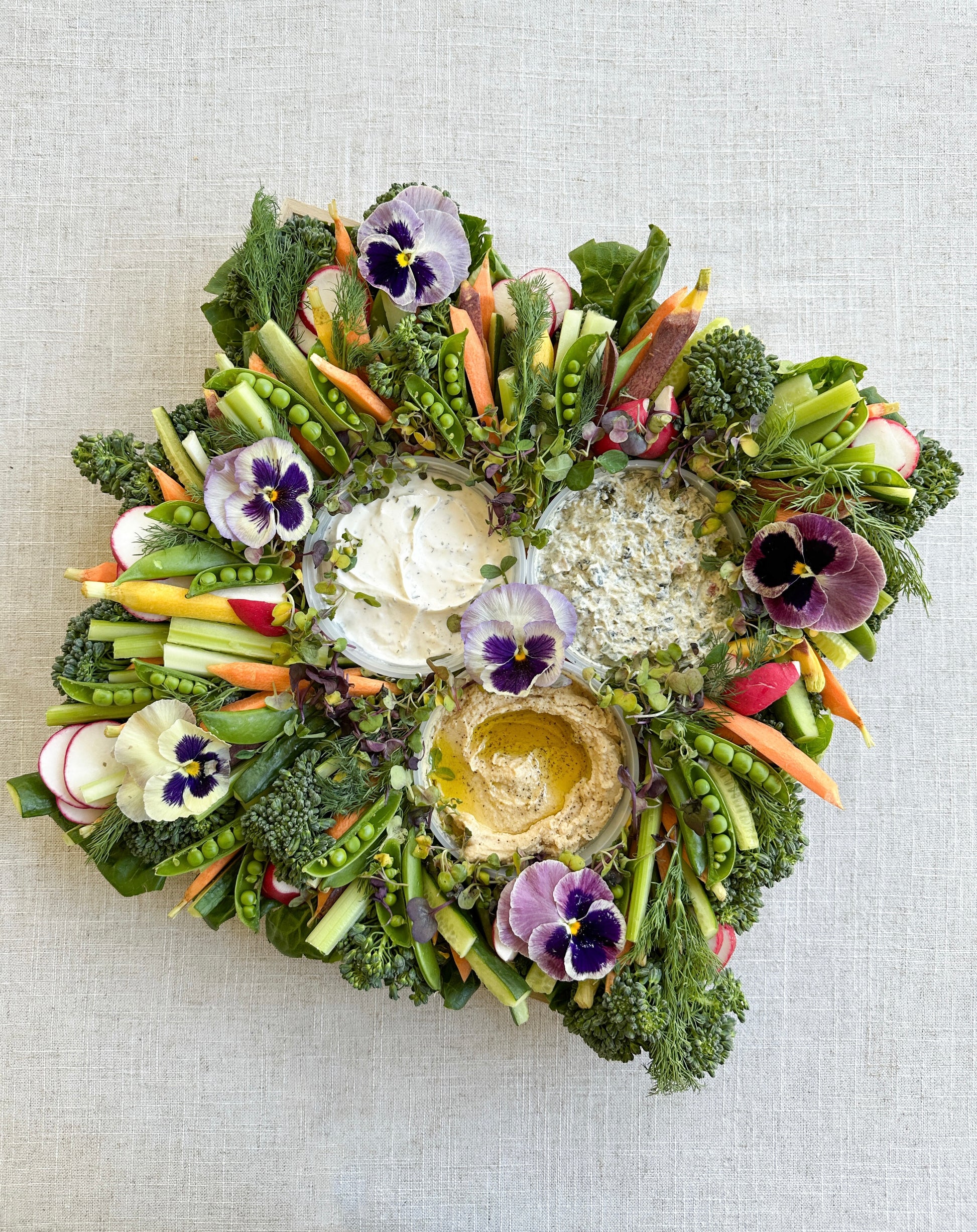 crudite board with edible flowers